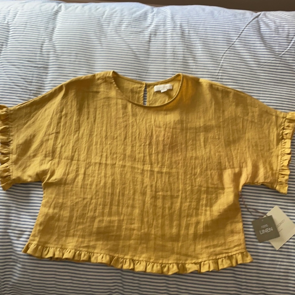 100% linen blouse - gold. Never worn. Loose boxy fit. Looks great with jeans!!